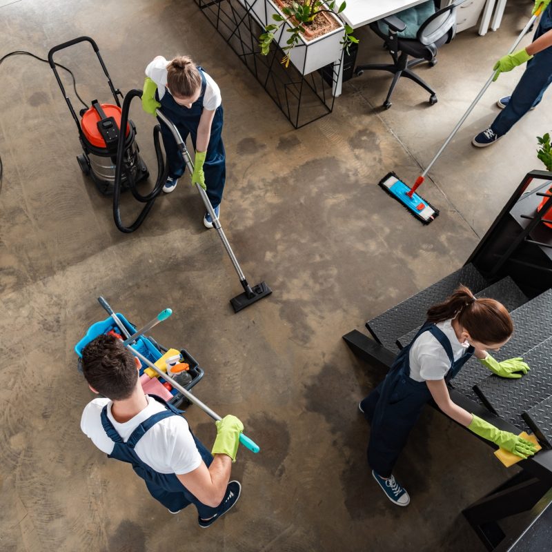 top view of cleaning company team cleaning modern office